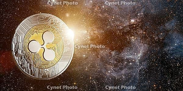 Ripple with rising sun behind, in starry space. Elements of this image furnished by NASA [IBR124944109]