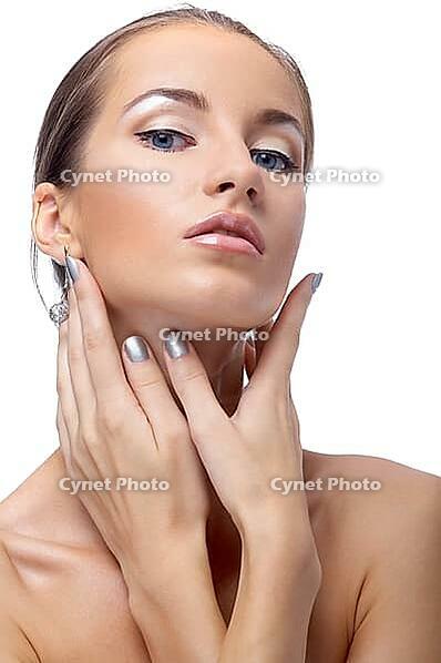 Close-up portrait of beautiful blue eyed caucasian model on white [IBR124968394]