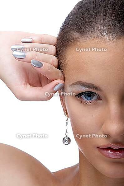 Close-up portrait of beautiful blue eyed caucasian model on white [IBR124968395]