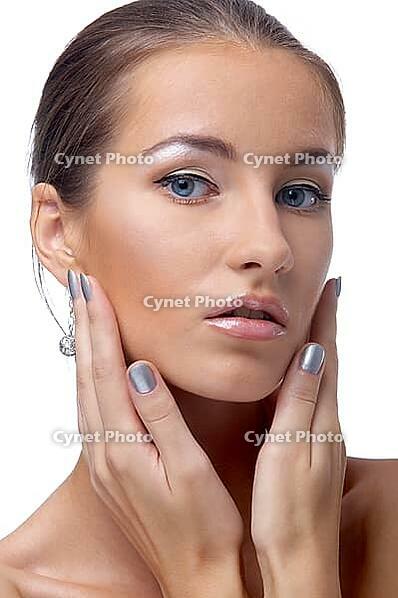 Close-up portrait of beautiful blue eyed caucasian model on white [IBR124968396]