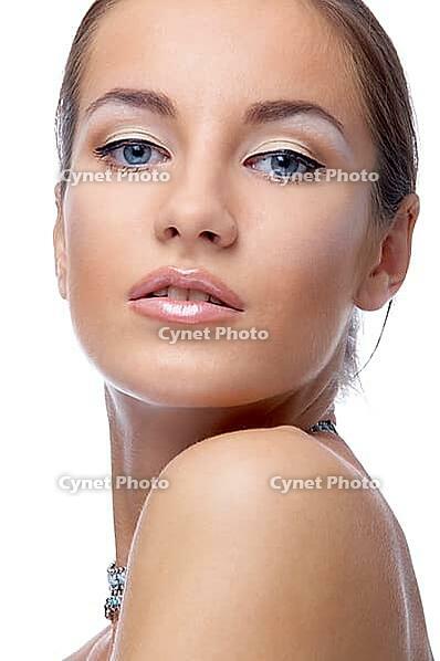 Close-up portrait of beautiful blue eyed caucasian model on white [IBR124968397]