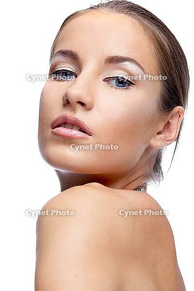 Close-up portrait of beautiful blue eyed caucasian model on white [IBR124968399]