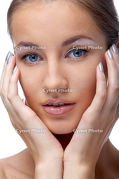 Close-up portrait of beautiful blue eyed caucasian model on white [IBR124968401]