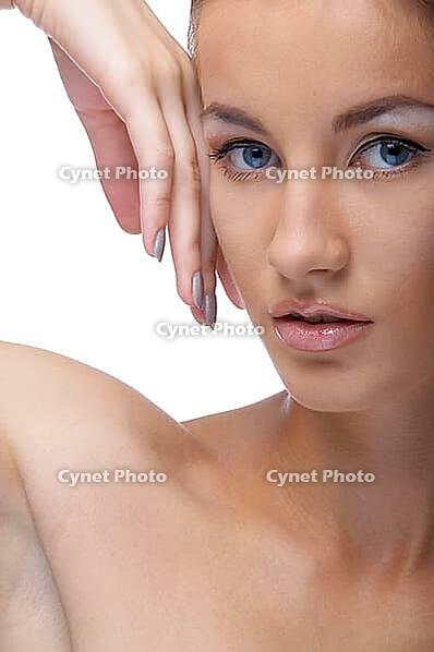 Close-up portrait of beautiful blue eyed caucasian model on white [IBR124968403]