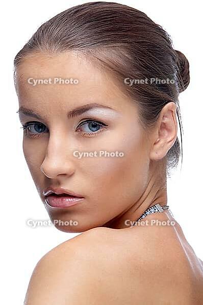 Close-up portrait of beautiful blue eyed caucasian model on white [IBR124968405]