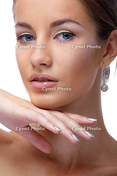Close-up portrait of beautiful blue eyed caucasian model on white [IBR124968412]