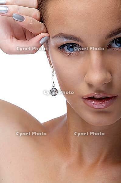Close-up portrait of beautiful blue eyed caucasian model on white [IBR124968414]
