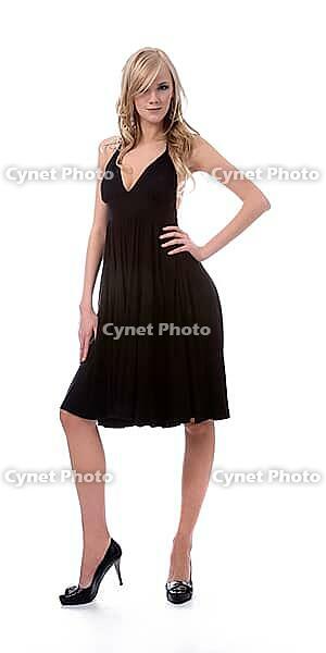 Portrait of beautiful blonde model poses in black dress [IBR124968415]