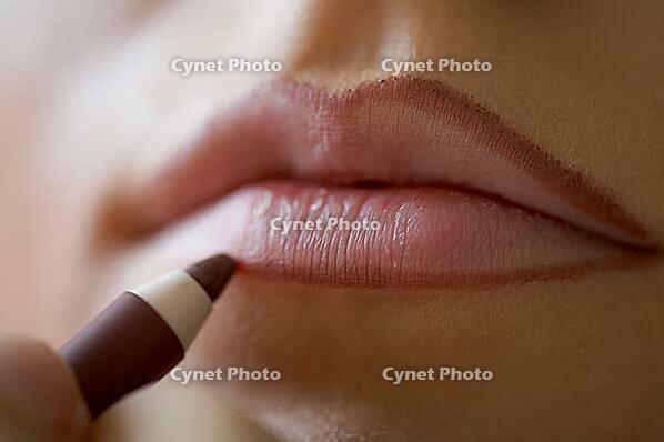 Close-up shot of work of make-up specialist. Low-focus image [IBR124968442]