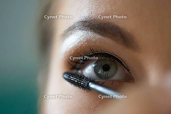 Close-up shot of work of make-up specialist. Low-focus image [IBR124968454]