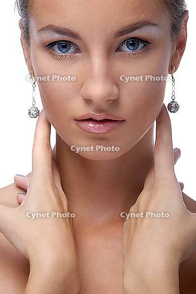 Close-up portrait of beautiful blue eyed caucasian model on white [IBR124968455]