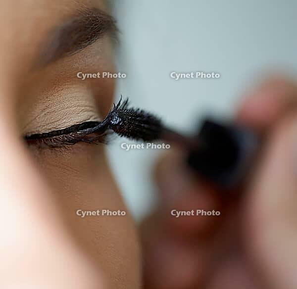 Close-up shot of work of make-up specialist. Low-focus image [IBR124968464]