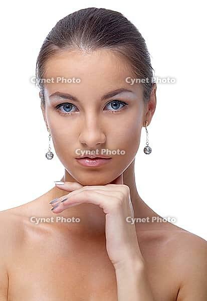 Close-up portrait of beautiful blue eyed caucasian model on white [IBR124968465]