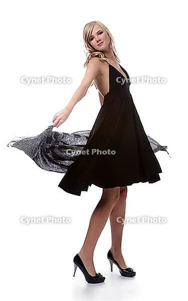 Portrait of beautiful blonde model poses in black dress with shawl [IBR124968469]