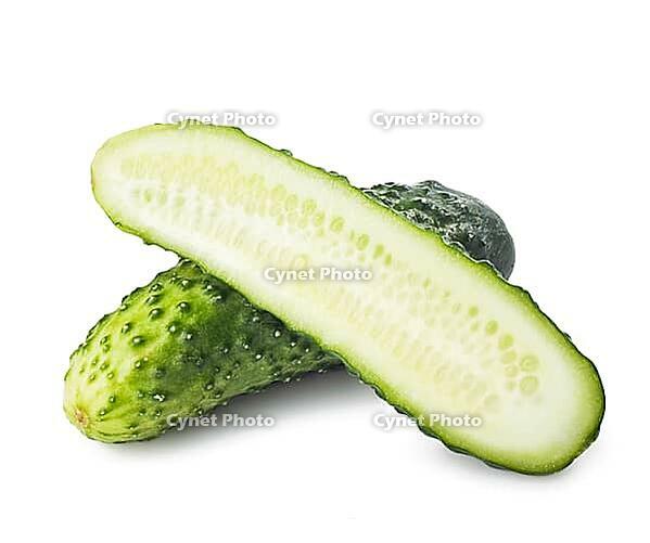Healthy food. The green cucumbers on white background [IBR124991081]