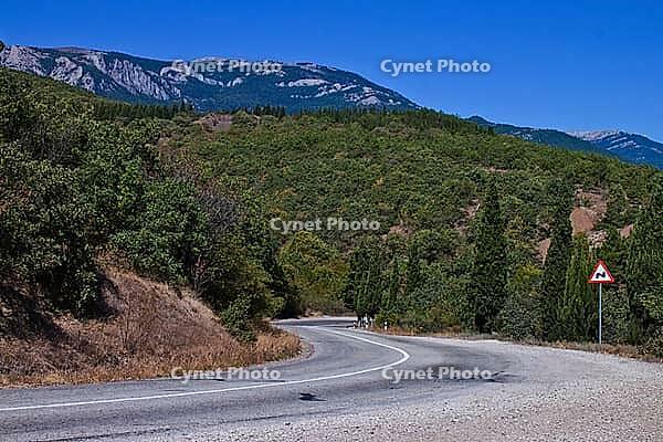 Crimean mountain road on a clear day in summer [IBR124991128]