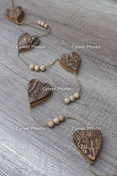 Wooden hearts, strung on a cord, Kempen, Viersen District, North Rhine-Westphalia, Germany [IBR125007577]