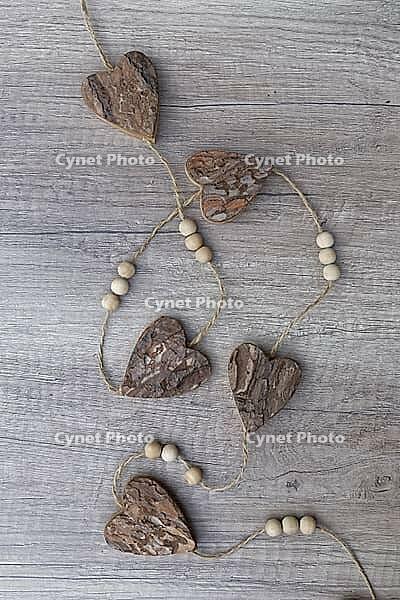 Wooden hearts, strung on a cord, Kempen, Viersen District, North Rhine-Westphalia, Germany [IBR125007578]