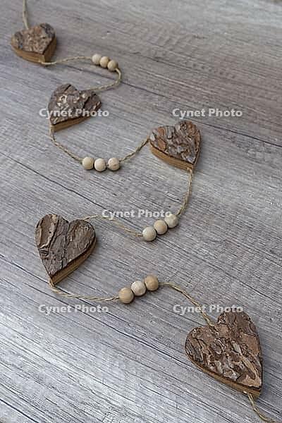 Wooden hearts, strung on a cord, Kempen, Viersen District, North Rhine-Westphalia, Germany [IBR125007595]