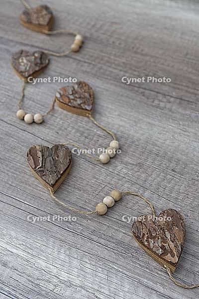 Wooden hearts, strung on a cord, Kempen, Viersen District, North Rhine-Westphalia, Germany [IBR125007614]