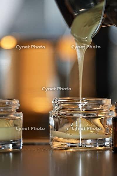 Homemade cream is filled into small jars, Kempen, Viersen district, North Rhine-Westphalia, Germany [IBR125007634]