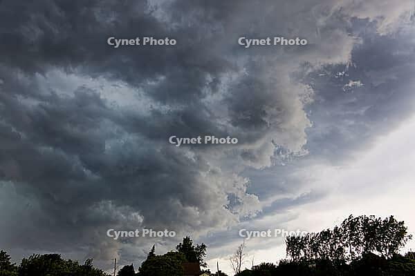 Nature, sky filled with dense storm clouds, Province of Quebec, Canada [IBR125026196]