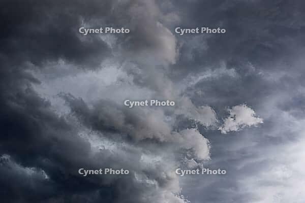 Nature, sky filled with dense storm clouds, Province of Quebec, Canada [IBR125026202]