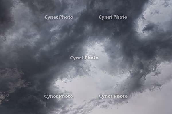 Nature, sky filled with dense storm clouds, Province of Quebec, Canada [IBR125026204]