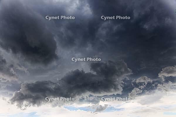 Nature, sky filled with dense storm clouds, Province of Quebec, Canada [IBR125026205]
