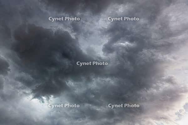 Nature, sky filled with dense storm clouds, Province of Quebec, Canada [IBR125026206]