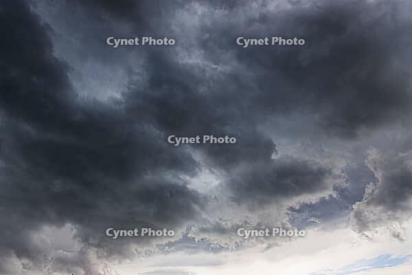 Nature, sky filled with dense storm clouds, Province of Quebec, Canada [IBR125026207]