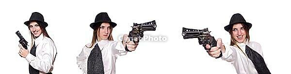 Young woman holding handgun isolated on white [IBR125053192]