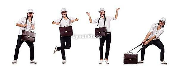 Young man with handbag and hat isolated on white [IBR125053194]