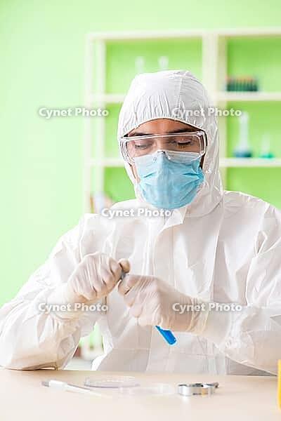 Chemist working in the lab on new experiment [IBR125062188]