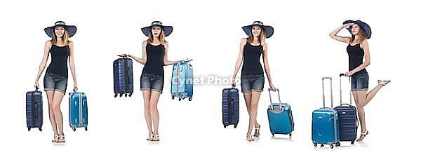 Girl with suitcases isolated on white [IBR125062204]