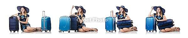 Woman planning to go on summer vacation [IBR125062205]