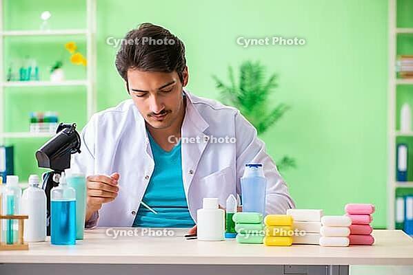 Chemist testing soap in the lab [IBR125062206]