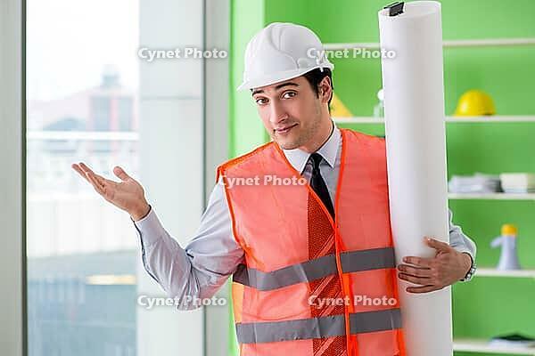 Man architect working on the project [IBR125062210]