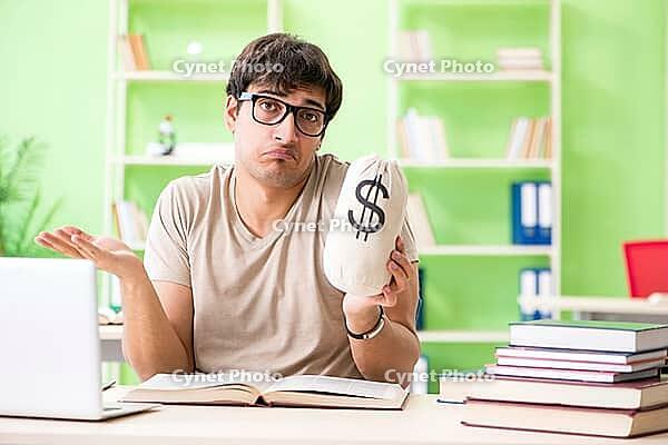 Young student in expensive tuition concept [IBR125062245]