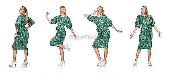Young woman in green dress isolated on white [IBR125075713]
