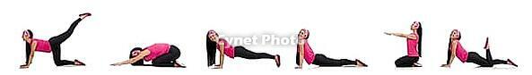 Woman doing exercises on white [IBR125075733]