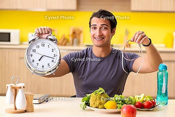 Young man in dieting and healthy eating concept [IBR125075739]