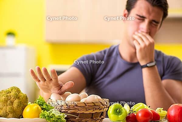 Young man in dieting and healthy eating concept [IBR125075766]