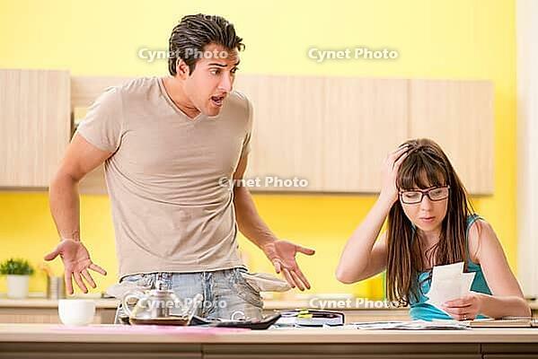 Young family struggling with personal finance [IBR125075769]