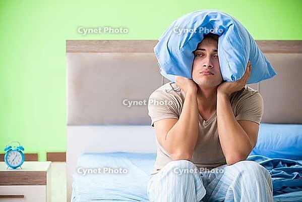 Man suffering from sleeping disorder and insomnia [IBR125075782]