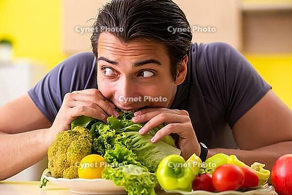 Young man in dieting and healthy eating concept [IBR125075790]