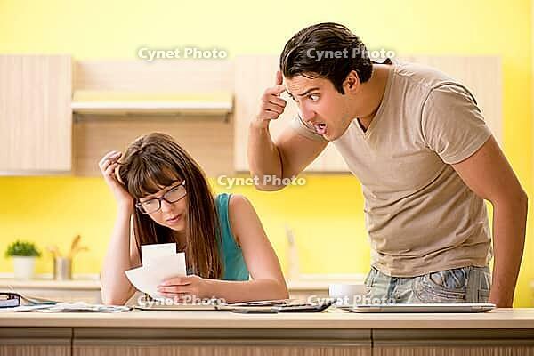 Young family struggling with personal finance [IBR125075806]