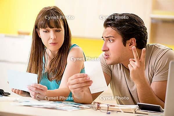 Young family struggling with personal finance [IBR125075809]