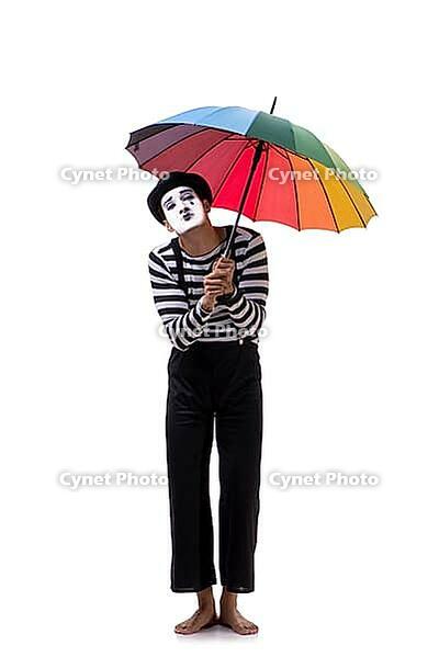 Mime with umbrella isolated on white background [IBR125094341]