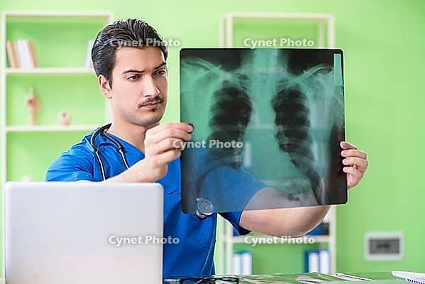 Young doctor working in the hospital [IBR125094388]
